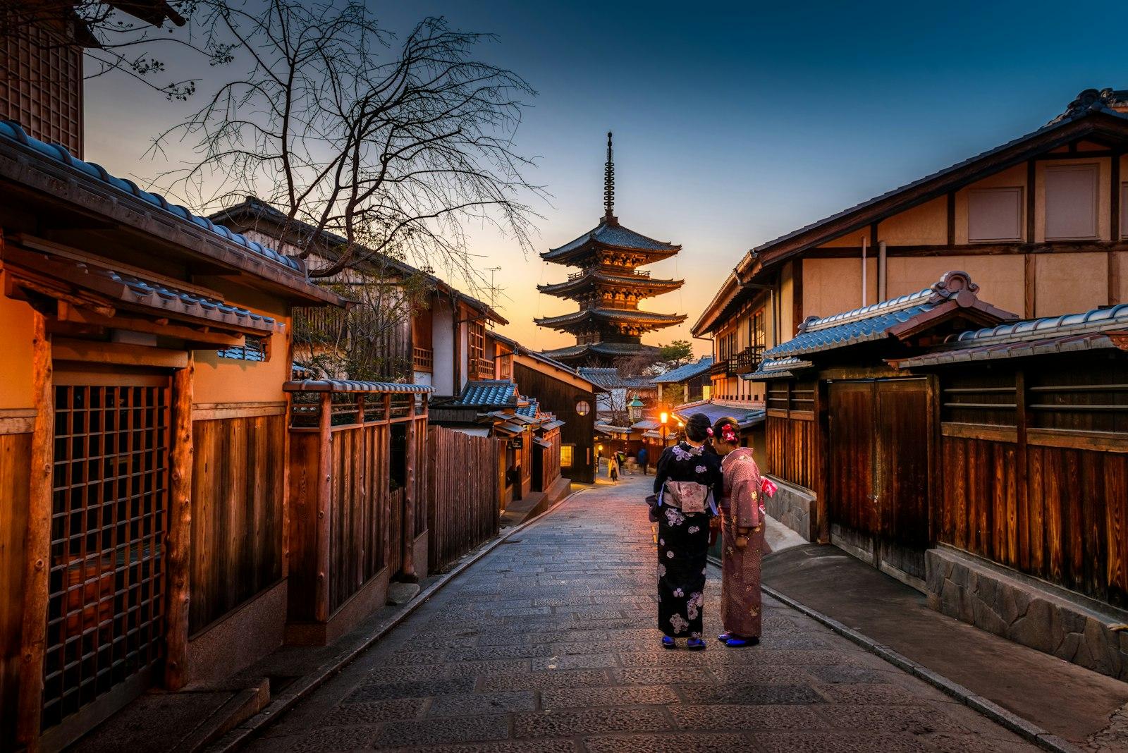 Japanese pagoda with cherry blossoms and Mount Fuji