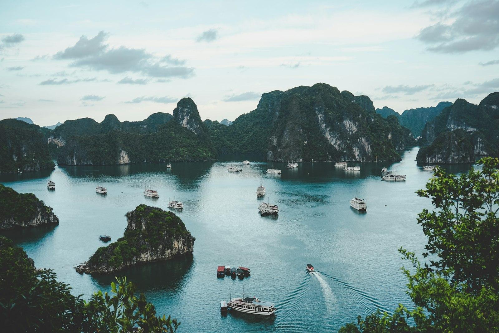 Boats among limestone karsts in Ha Long Bay, Vietnam